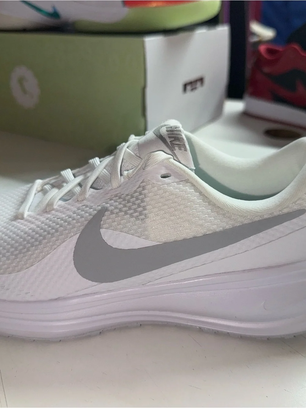 Nike Women’s White Athletic Running Shoes with Gray Swoosh